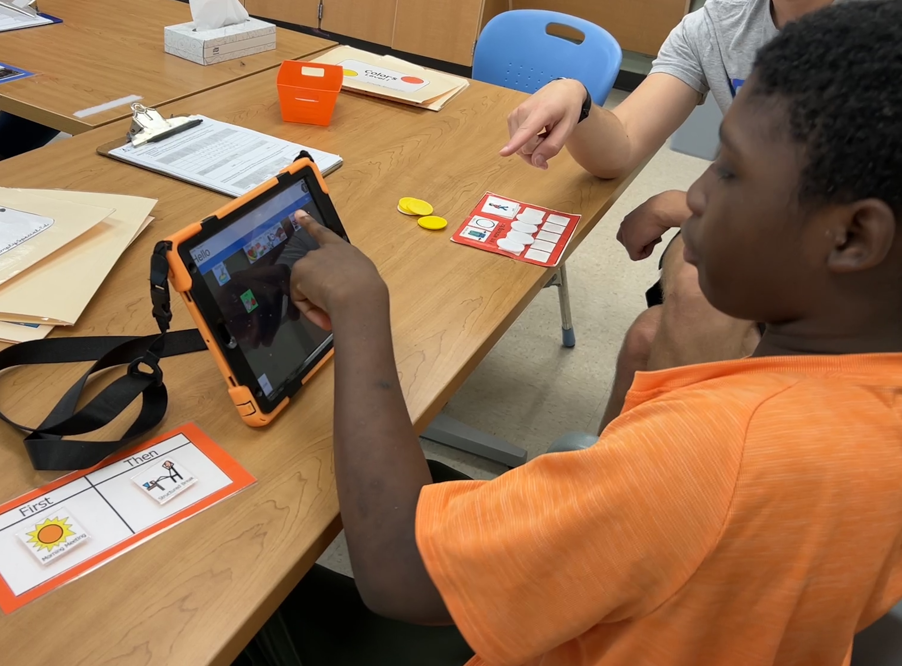 a student uses a communication device