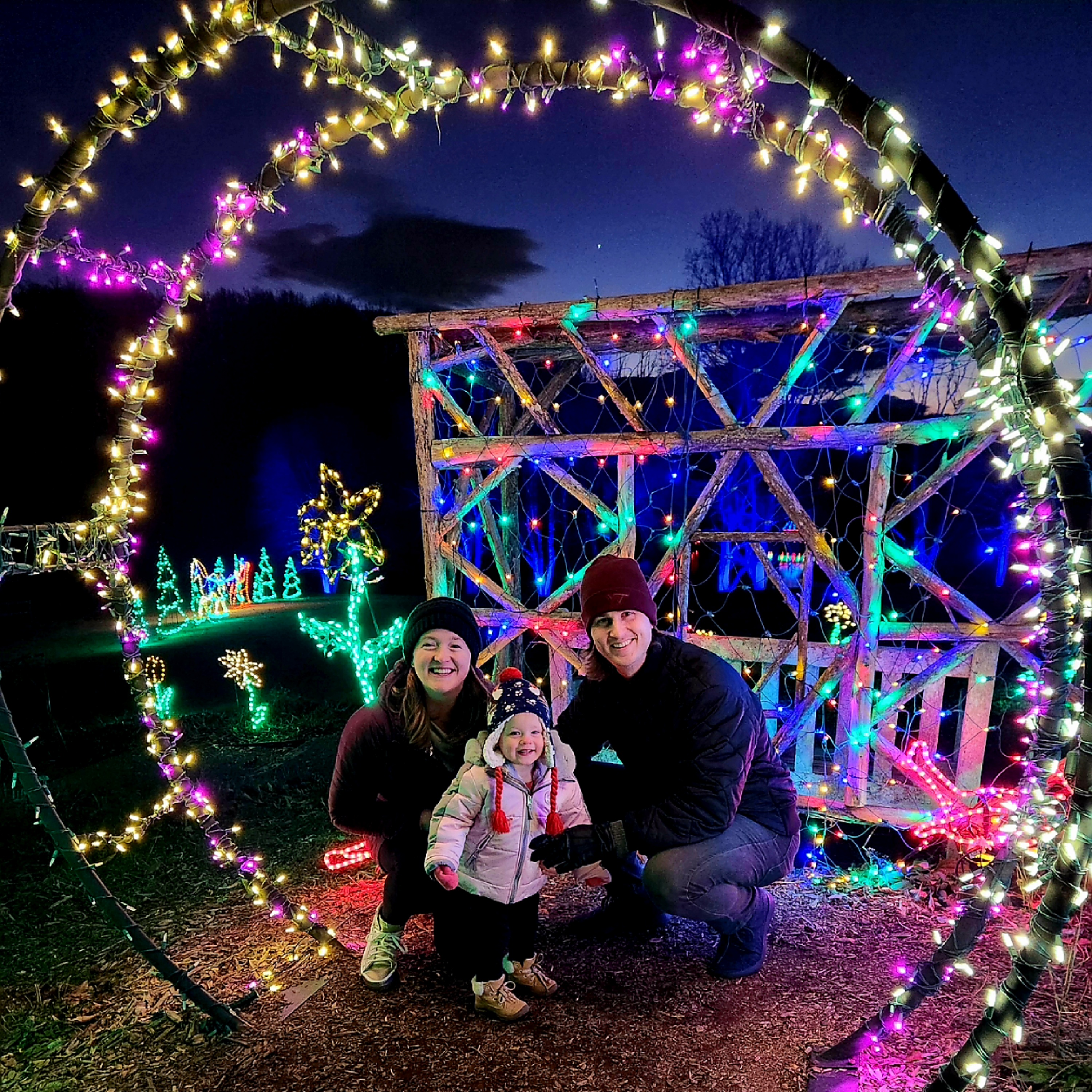 Sarah with family- holiday lights