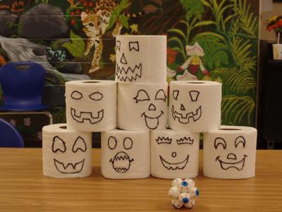 One of the more creative games! Knock over decorated toilet paper rolls