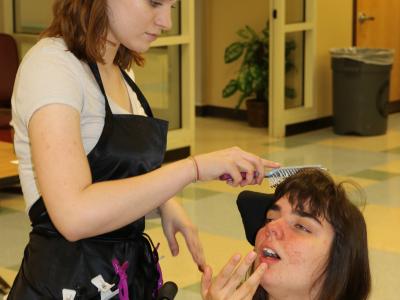 Students from Lee HS cosmetology program came to help with hair, makeup and nails