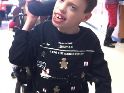Student supporting "Ugly Sweater" day