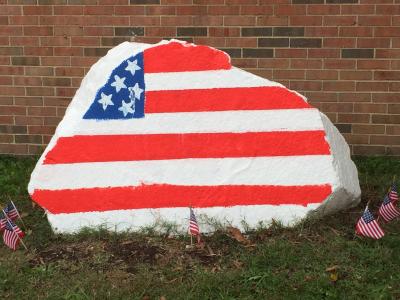 We painted our rock in honor of Veterans day