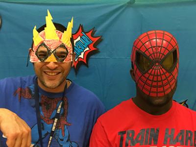 staff and students dressed as super heroes for our spirit week